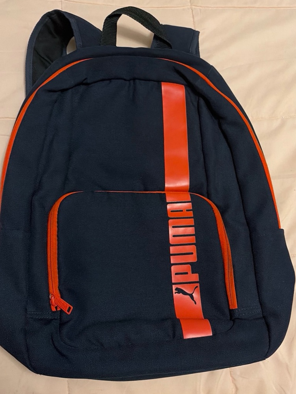 Puma Navy Blue Backpack with Orange Accents